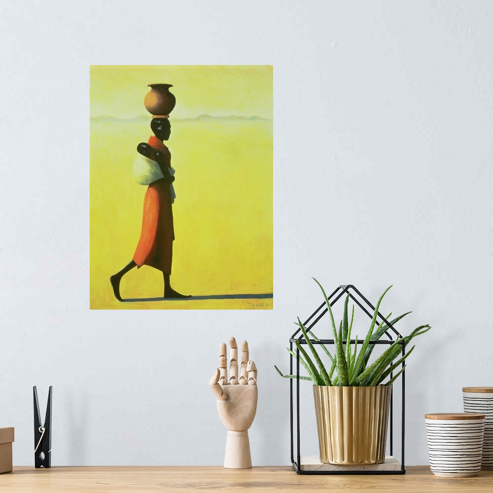 A bohemian room featuring This vertical painting shows a single African woman walking through the desert with an urn balanc...