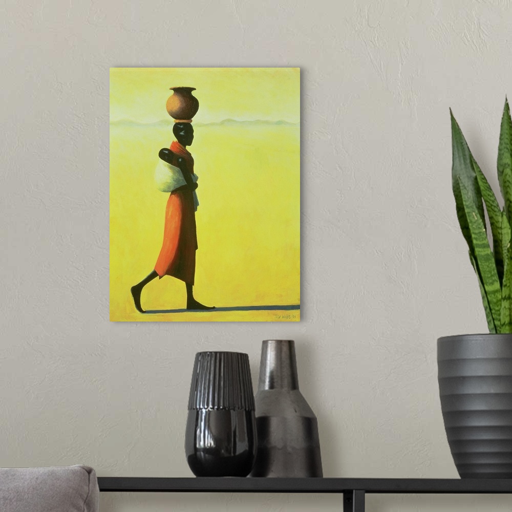 A modern room featuring This vertical painting shows a single African woman walking through the desert with an urn balanc...