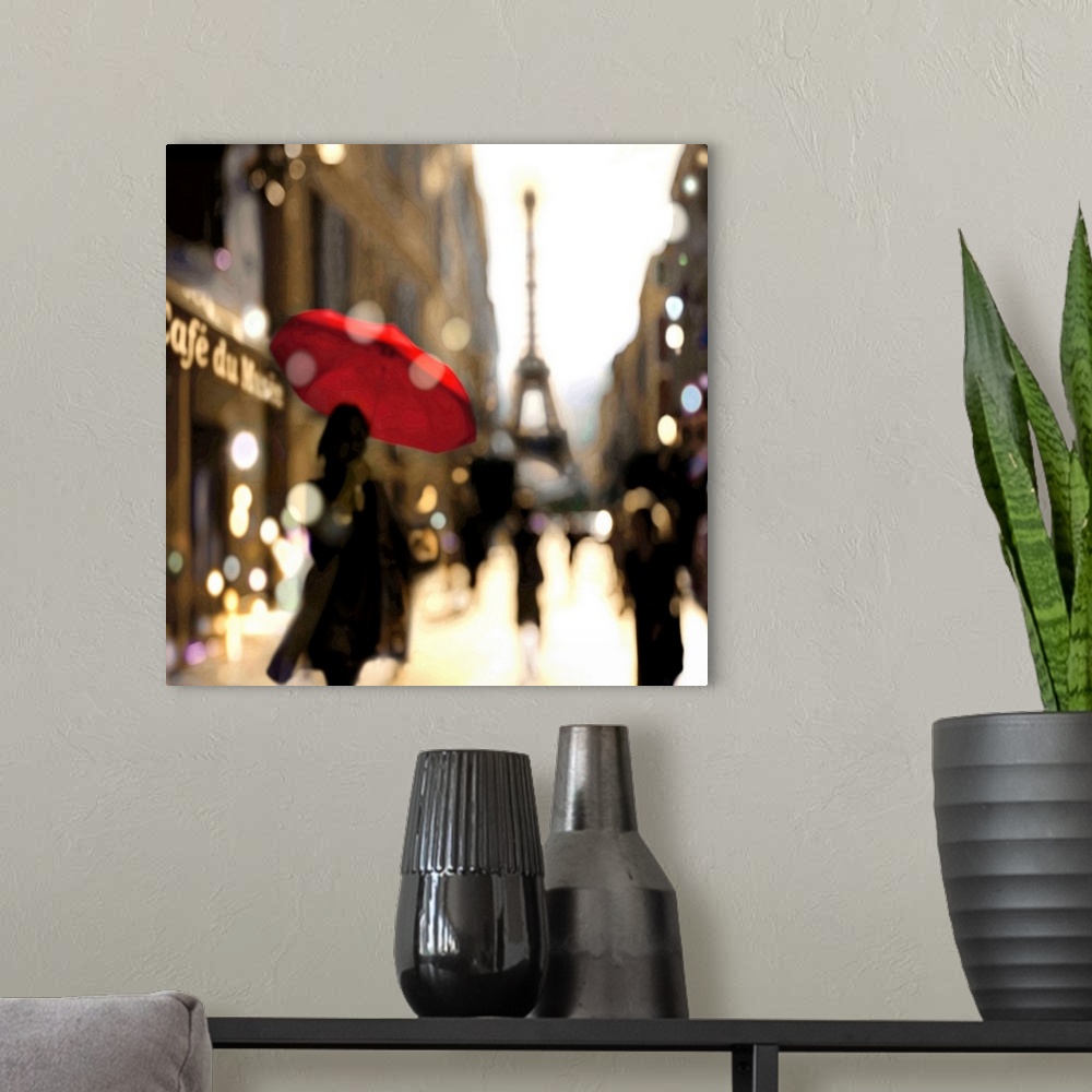 A modern room featuring Blurred square illustration of a figure walking down a Paris street carrying a red umbrella with ...