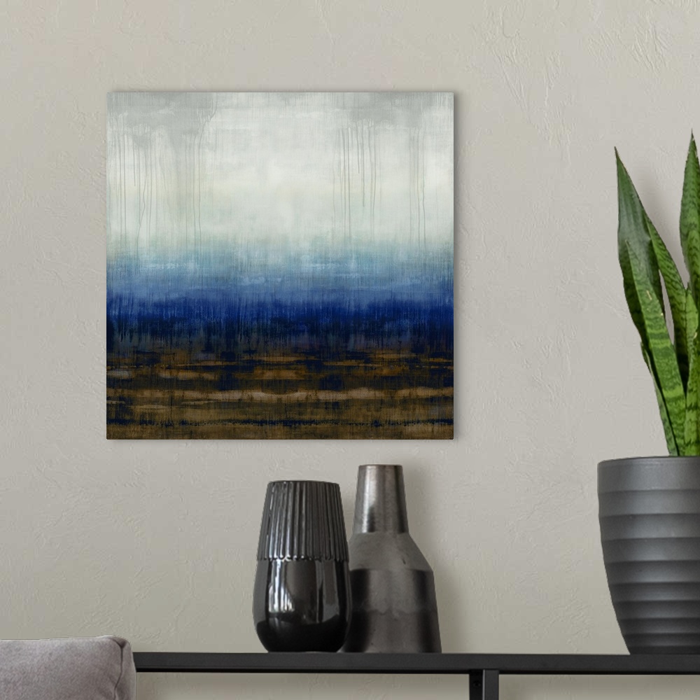 A modern room featuring Square abstract painting in shades of blue, brown, gray, and white.