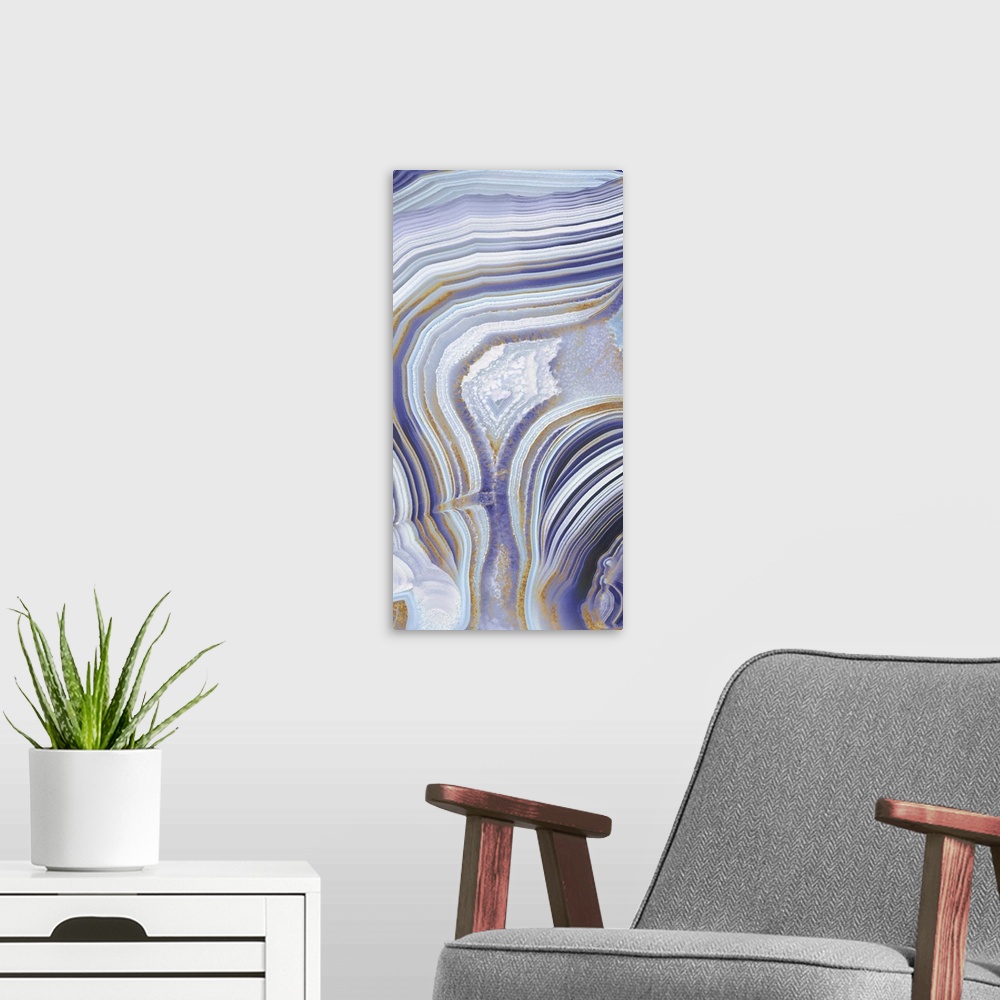 A modern room featuring Tall panel abstract art with a purple, gold, silver, and white agate pattern.