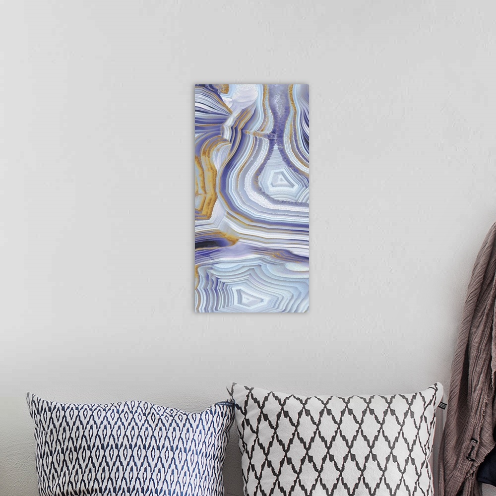 A bohemian room featuring Tall panel abstract art with a purple, gold, silver, and white agate pattern.