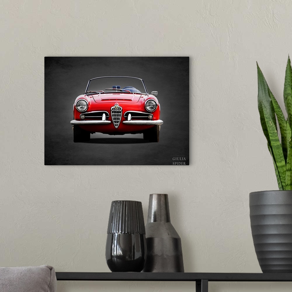 A modern room featuring Photograph of a red 1964 Alfa Giulia 1600 Spider printed on a black background with a dark vignette.