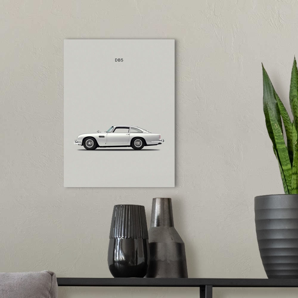 A modern room featuring Photograph of a silver Aston DB5 1965 printed on a silver background.