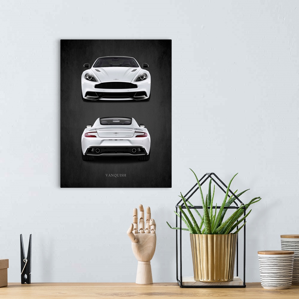 A bohemian room featuring Photograph of a the front and back of a white Aston Martin Vanquish printed on a black background...