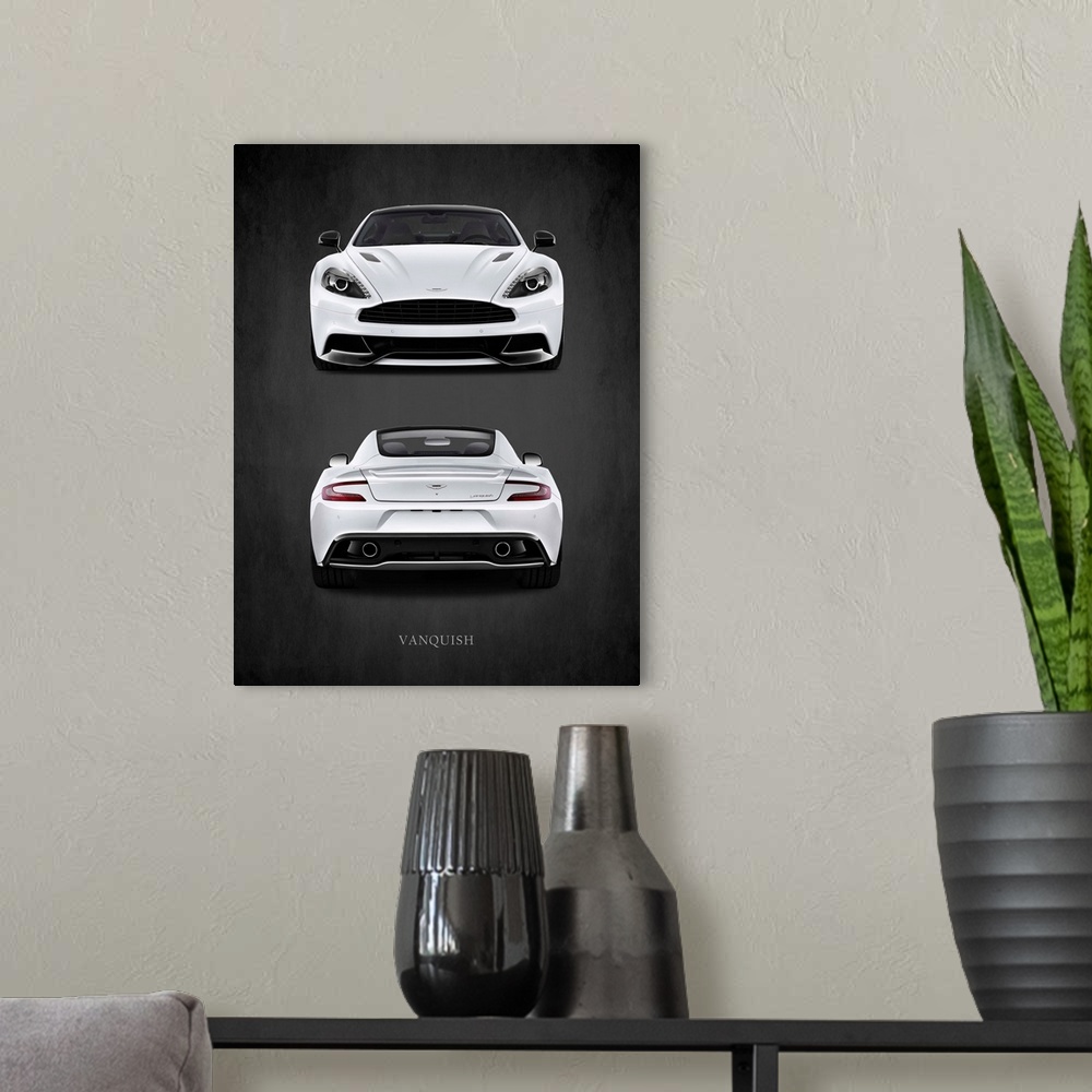 A modern room featuring Photograph of a the front and back of a white Aston Martin Vanquish printed on a black background...