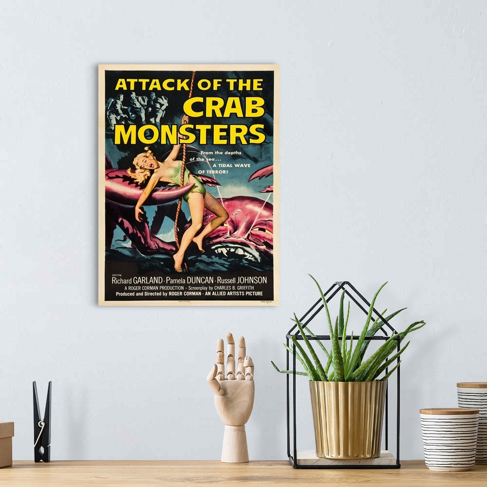 A bohemian room featuring Vintage movies poster for Attack Of The Crab Monsters.