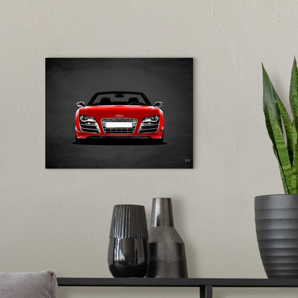 A modern room featuring Photograph of a red Audi R8 printed on a black background with a dark vignette.