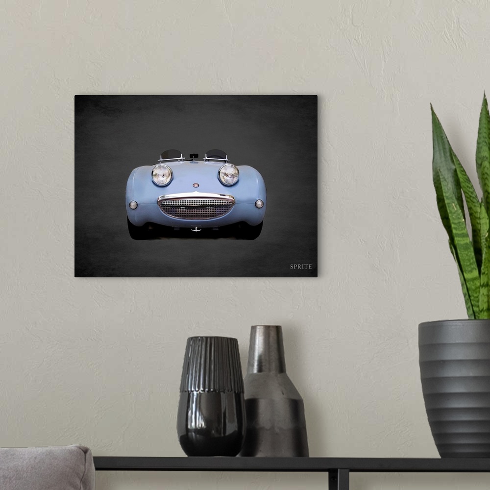 A modern room featuring Photograph of a powder blue Austin-Healey Sprite Mk1 printed on a black background with a dark vi...