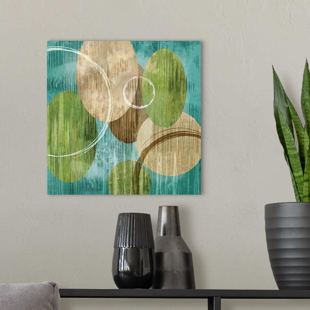 A modern room featuring Square abstract art with green, brown, and white circles on a teal background with white paint dr...