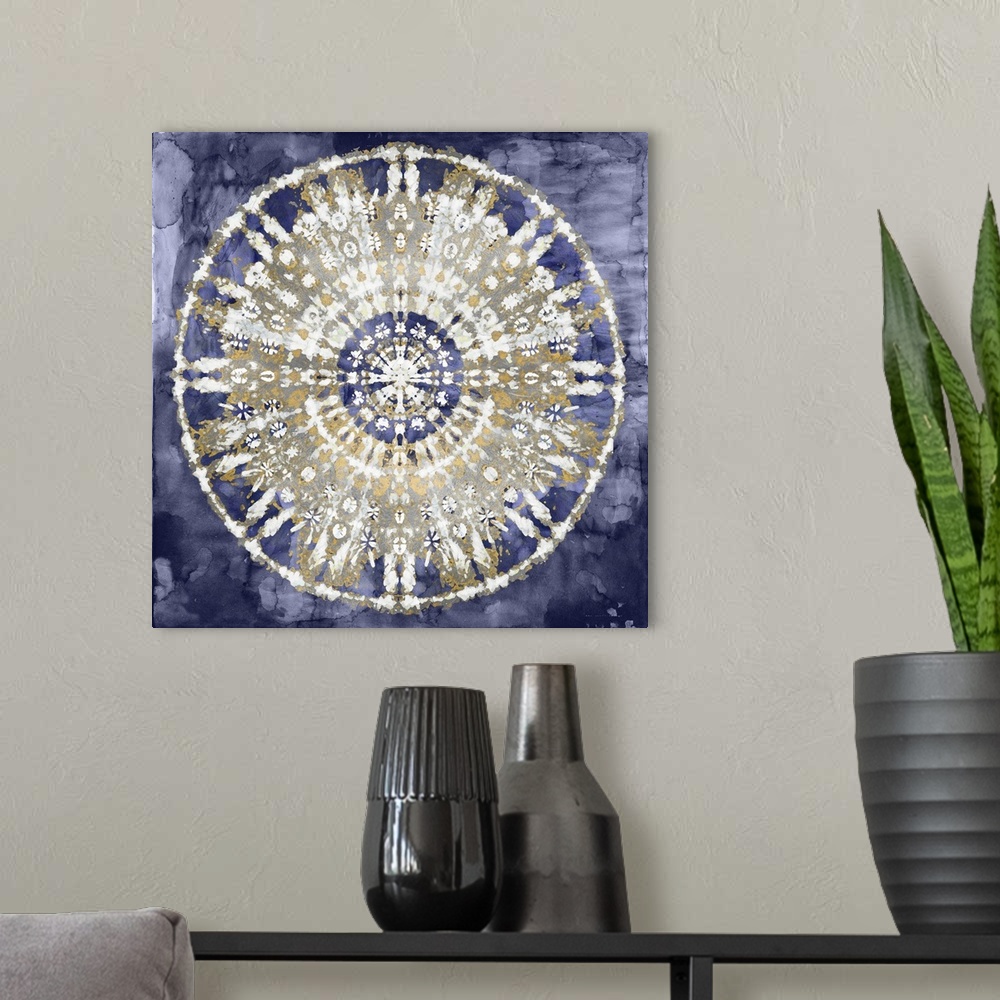 A modern room featuring Square abstract decor with a white, gold, and silver mandala on an indigo background.