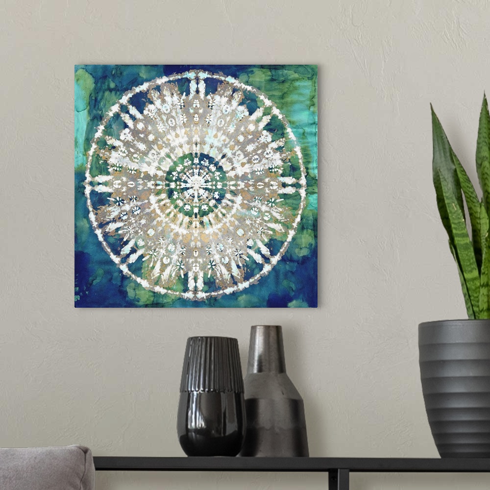 A modern room featuring Square abstract decor with a white, gold, and silver mandala on a blue and green watercolor backg...