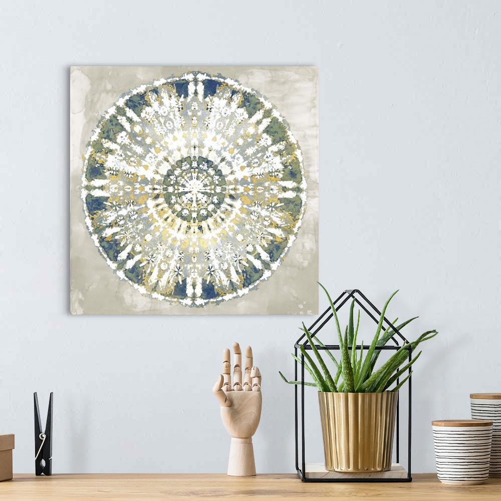 A bohemian room featuring Square abstract decor with a white, gold, green, blue, and silver mandala on a gray background.