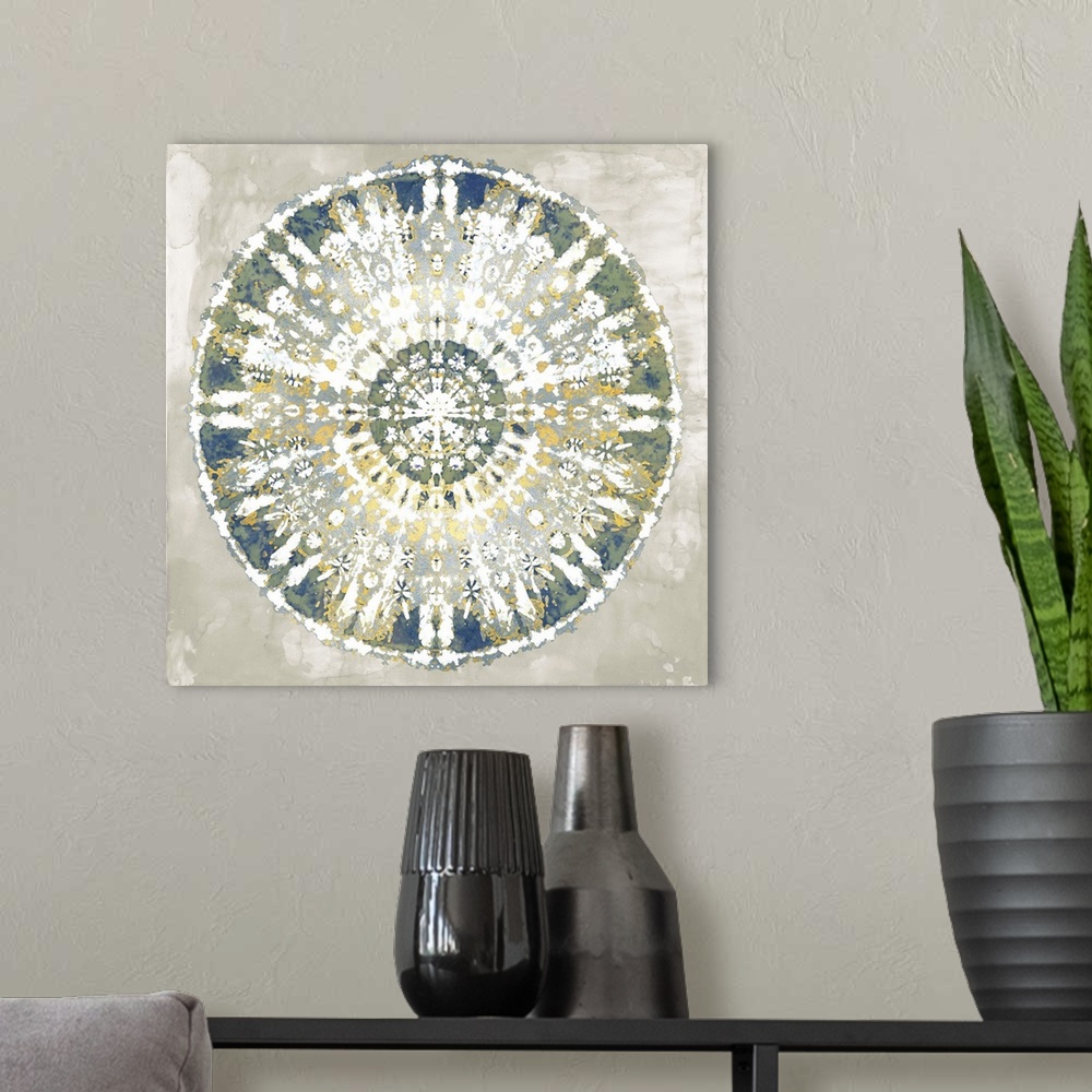 A modern room featuring Square abstract decor with a white, gold, green, blue, and silver mandala on a gray background.