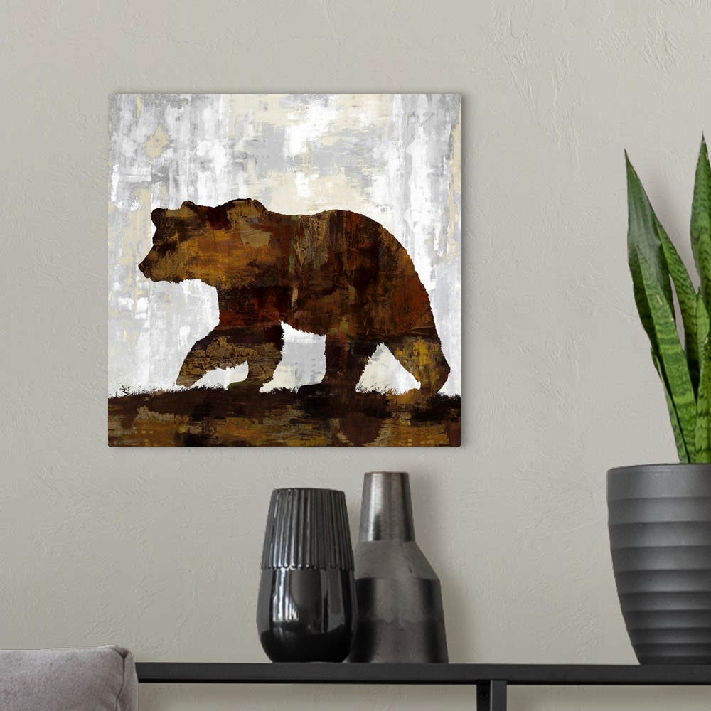 A modern room featuring Square decor with a silhouette of a brown bear on a gray, tan, and white background.