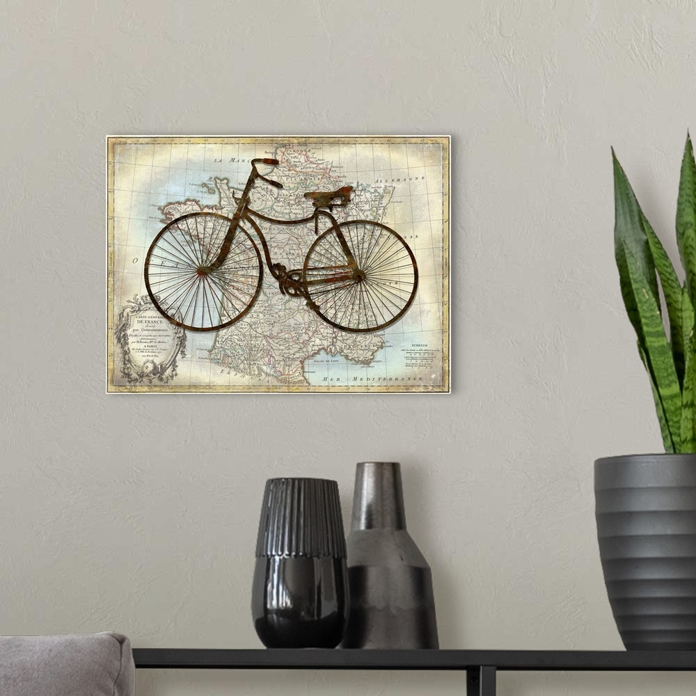 A modern room featuring Vintage decor with a silhouette of a bicycle on top of a map of France.