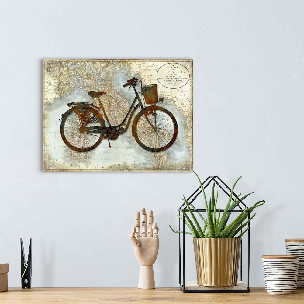 A bohemian room featuring Vintage decor with a silhouette of a bicycle on top of a map of Italy.