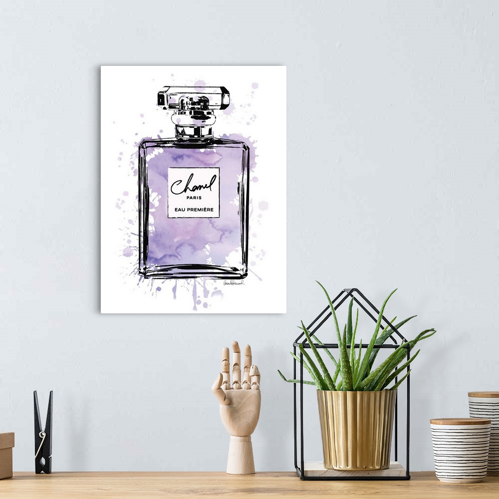 A bohemian room featuring A bottle of perfume filled with watercolor droplets.