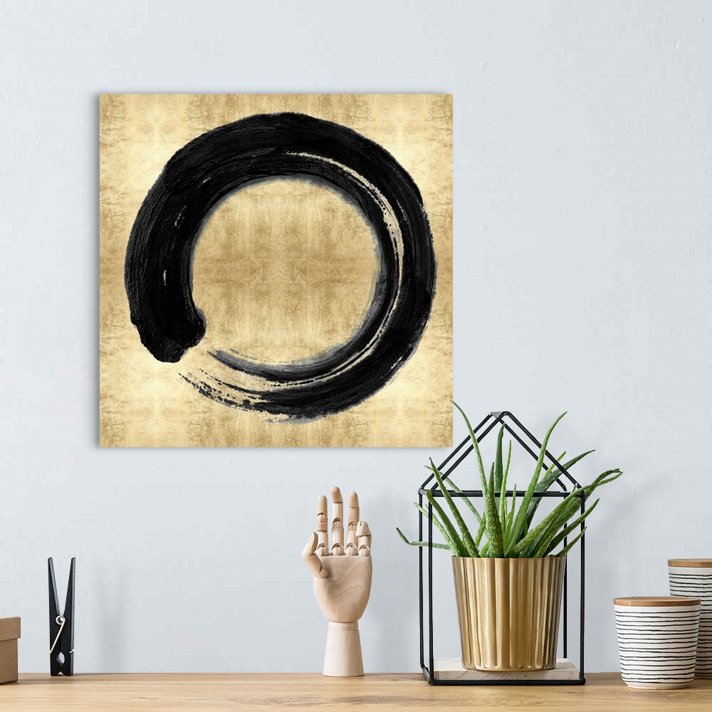 A bohemian room featuring This Zen artwork features a sweeping circular brush stroke in black over a mottled gold color bac...