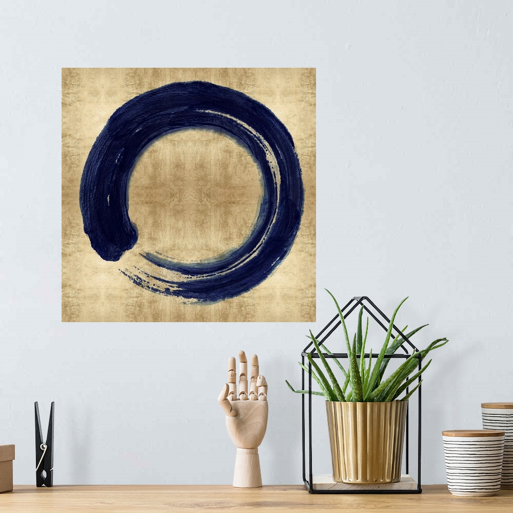 A bohemian room featuring This Zen artwork features a sweeping circular brush stroke in blue over a mottled gold color back...