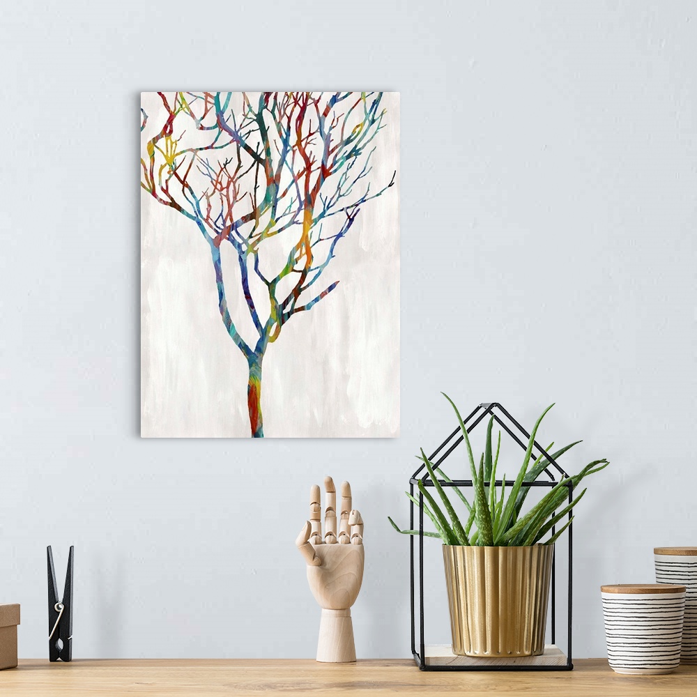 A bohemian room featuring Colorful silhouette of a leafless tree on a white and gray background.