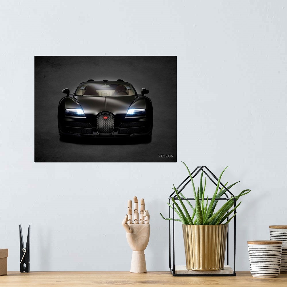 A bohemian room featuring Photograph of a black Bugatti Veyron printed on a black background with a dark vignette.