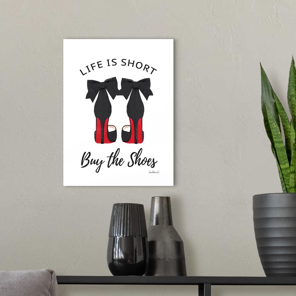 A modern room featuring Decorative artwork with the words: Life is short, buy the shoes.