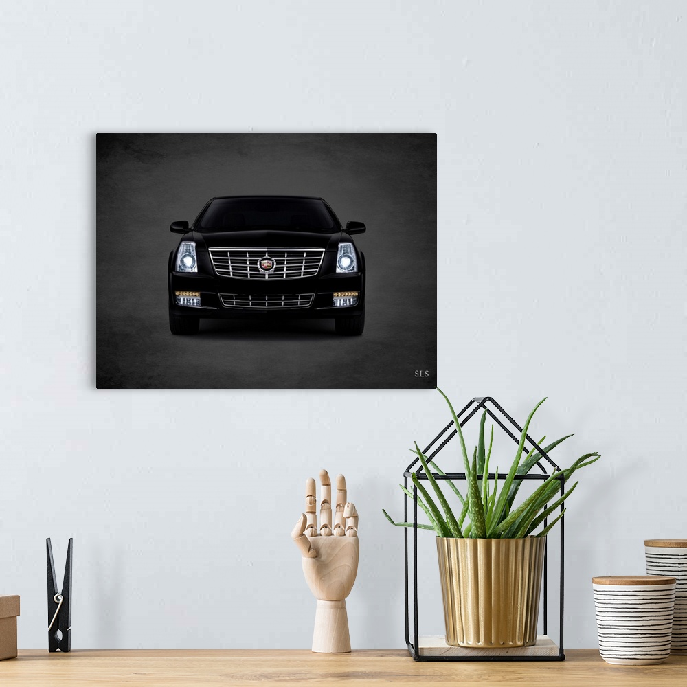 A bohemian room featuring Photograph of a black Cadillac SLS printed on a black background with a dark vignette.