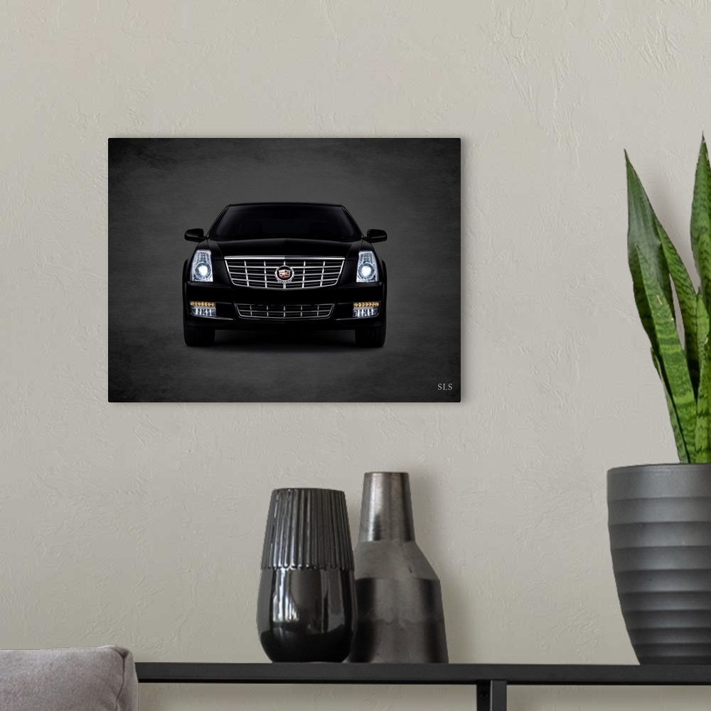 A modern room featuring Photograph of a black Cadillac SLS printed on a black background with a dark vignette.