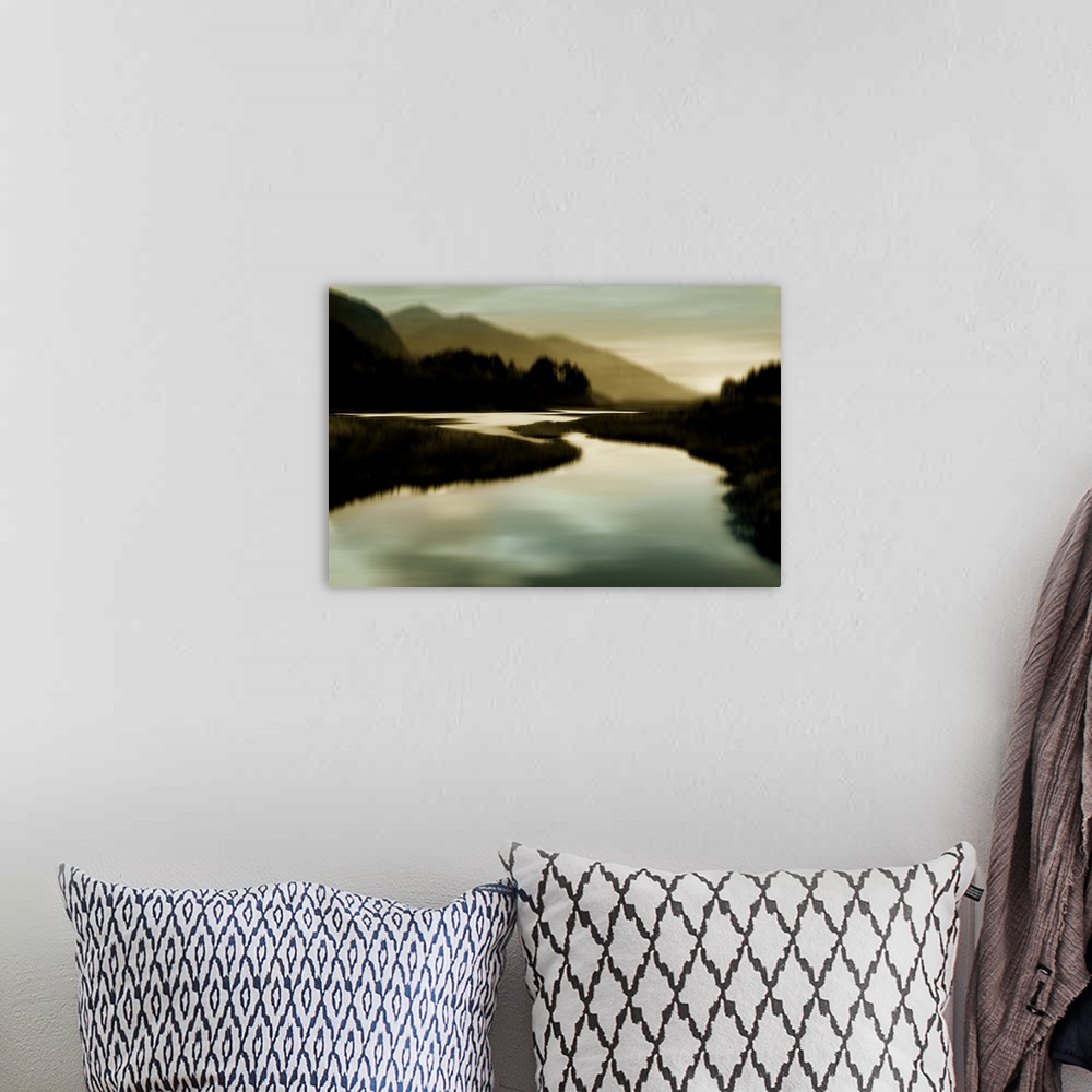 A bohemian room featuring Contemporary artwork of a river view landscape as a blurred silhouette.