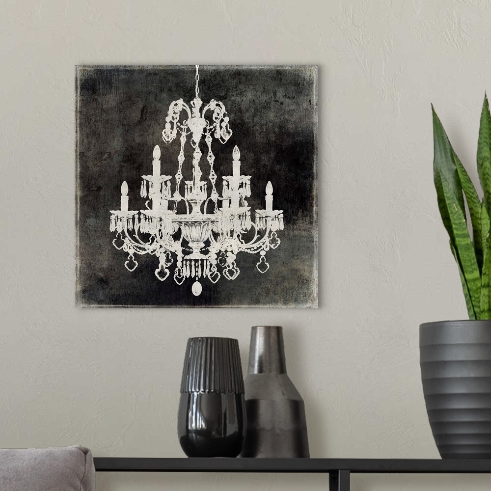 A modern room featuring Square decor with a silver chandelier on a distressed black background.