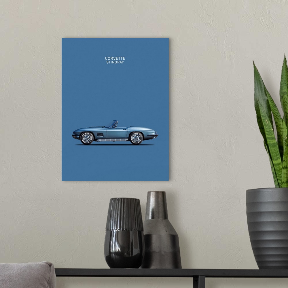A modern room featuring Photograph of a blue Corvette Stingray 1967 printed on a blue background