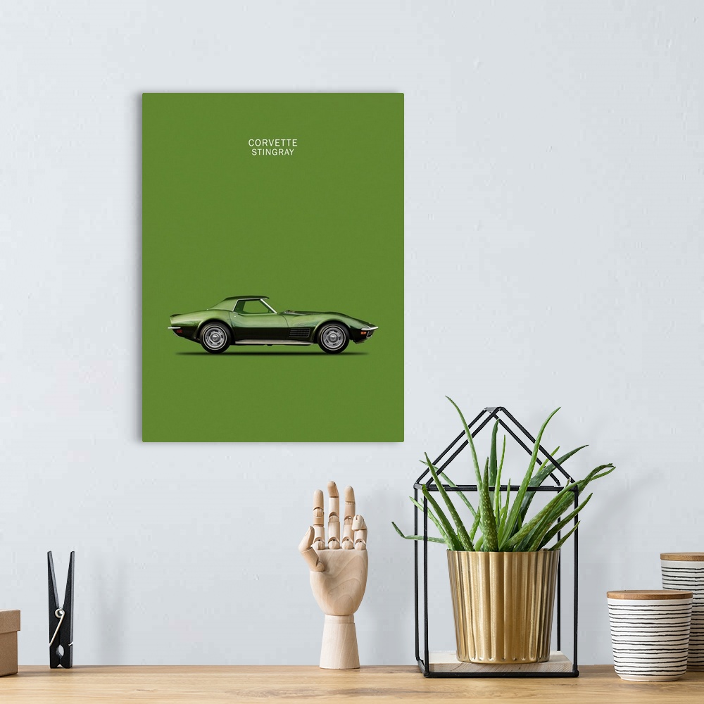 A bohemian room featuring Photograph of a dark green Corvette Stingray 1970 printed on a green background