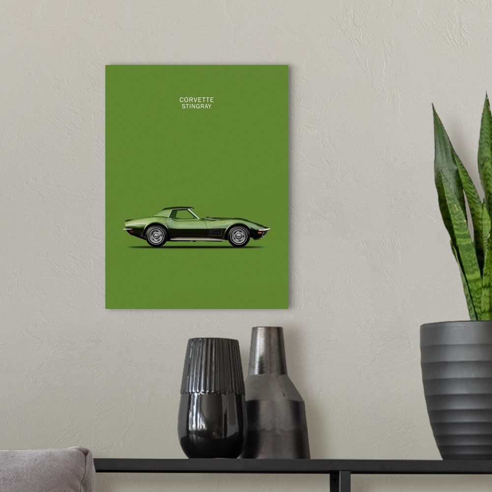 A modern room featuring Photograph of a dark green Corvette Stingray 1970 printed on a green background