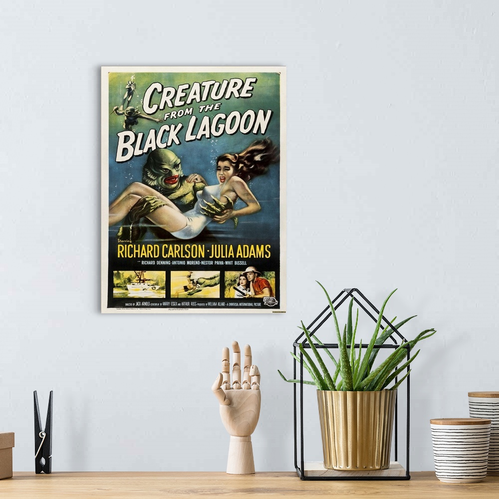 A bohemian room featuring Vintage movie poster for "Creature From The Black Lagoon"
