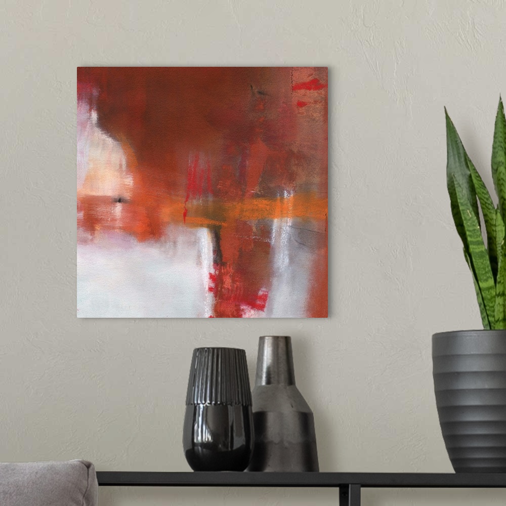 A modern room featuring Square abstract painting with deep red, burnt orange, orange, white, and black hues.
