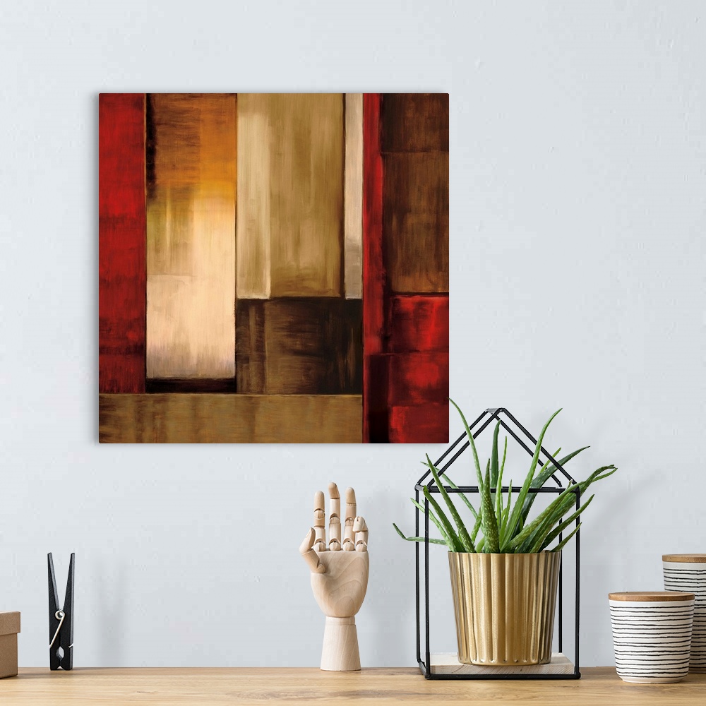 A bohemian room featuring Square abstract art created with rectangular shapes puzzled together in shades of red, orange, wh...