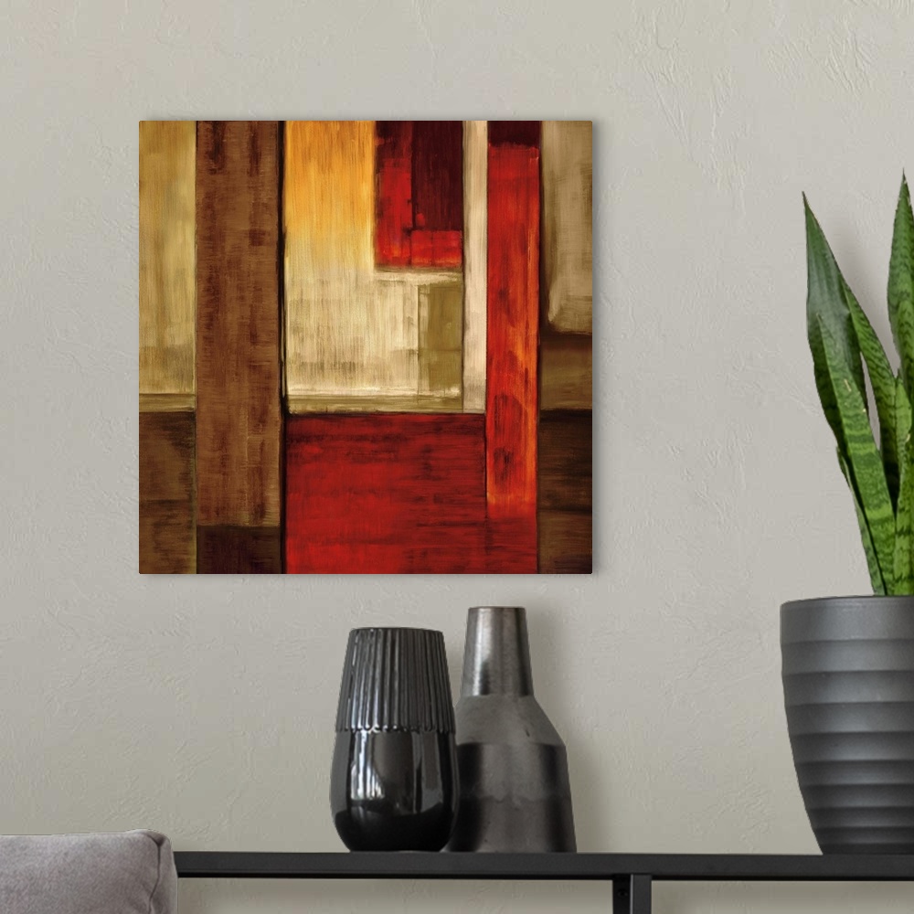A modern room featuring Square abstract art created with rectangular shapes puzzled together in shades of red, orange, wh...