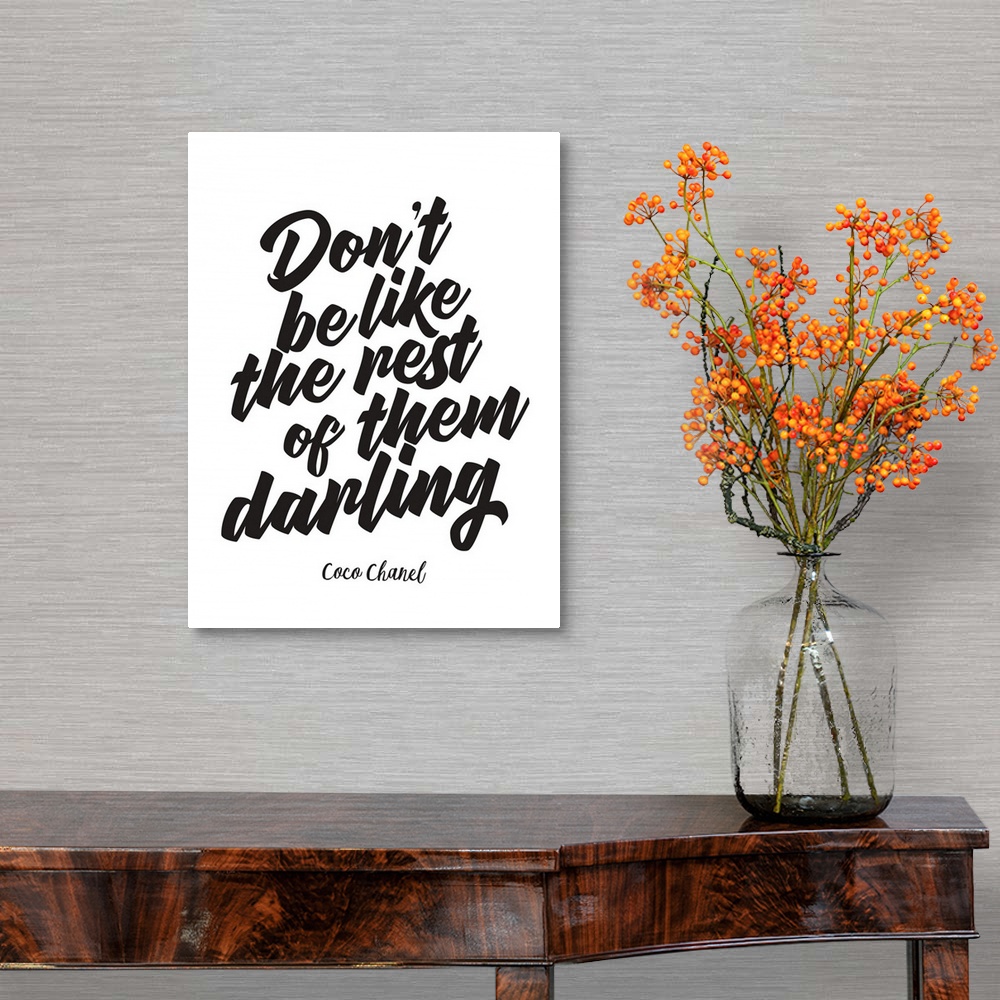 A traditional room featuring Decorative artwork with the words: Don't be like the rest of them darling.