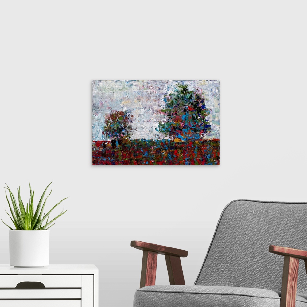 A modern room featuring Abstract landscape with two trees created with many colors and small, layered brushstrokes.