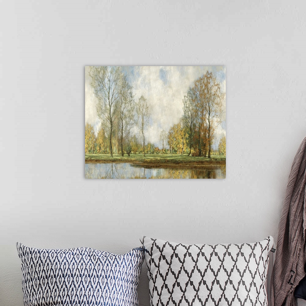 A bohemian room featuring Landscape painting of tall slender trees overlooking a tranquil pond.