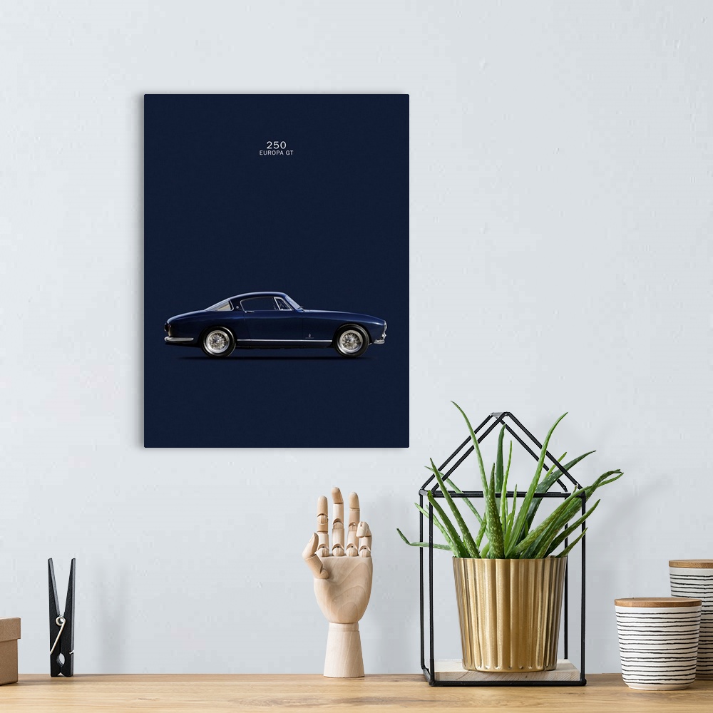 A bohemian room featuring Photograph of a navy blue Ferrari 250 Europa GT 1955 printed on a dark blue background