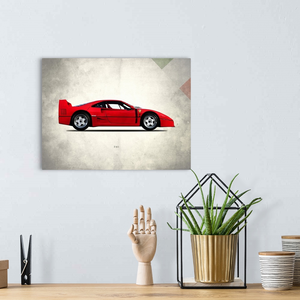 A bohemian room featuring Photograph of a red Ferrari F40 Berlinette 1992 printed on a distressed white and gray background...