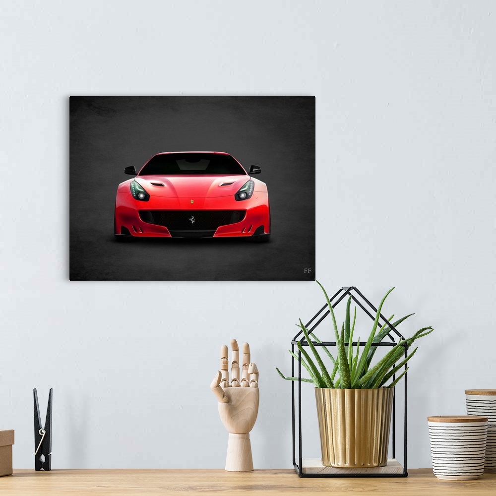 A bohemian room featuring Photograph of a red Ferrari FF printed on a black background with a dark vignette.