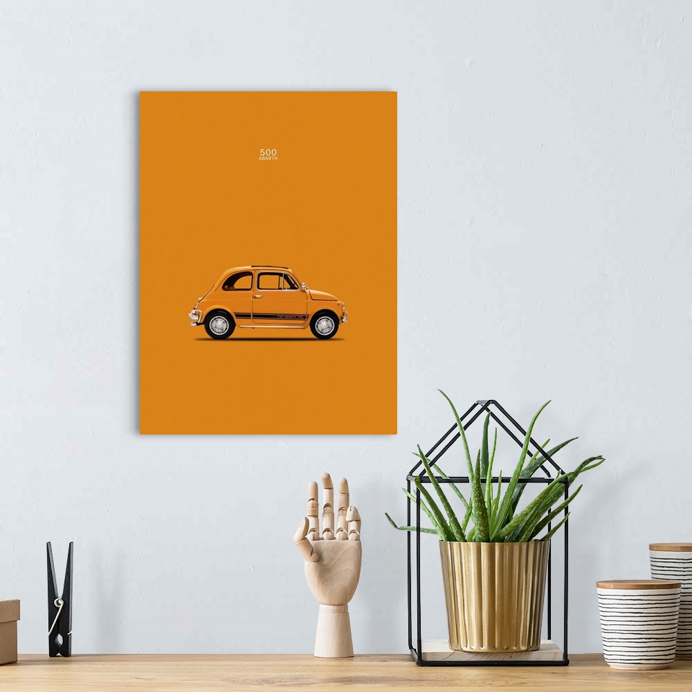 A bohemian room featuring Photograph of an orange Fiat 500 Abarth 1969 printed on an orange background