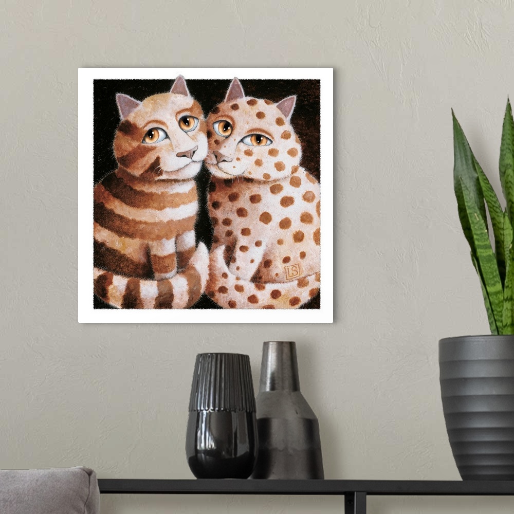 A modern room featuring Square painting of two patterned cats in sepia tones with a black background and a white border.