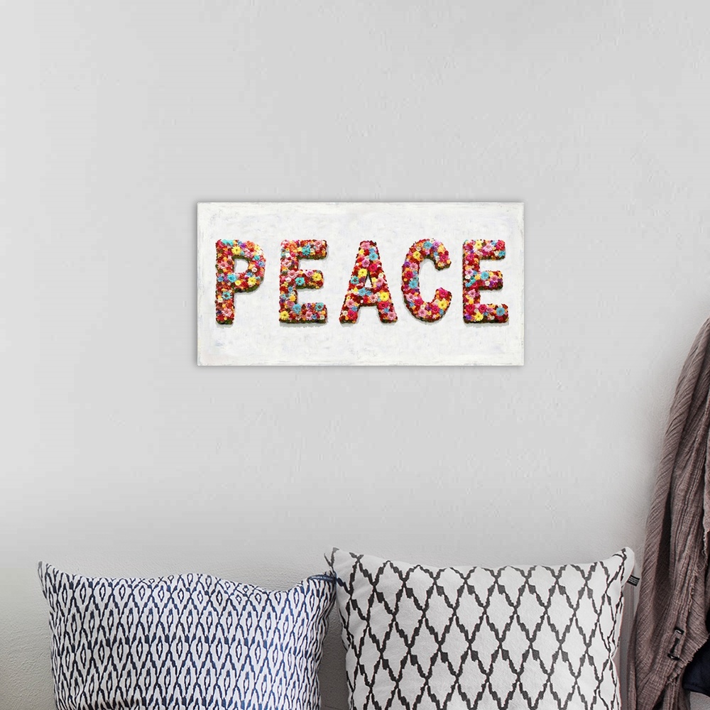 A bohemian room featuring The word peace is shaped by an assortment of colorful flowers.
