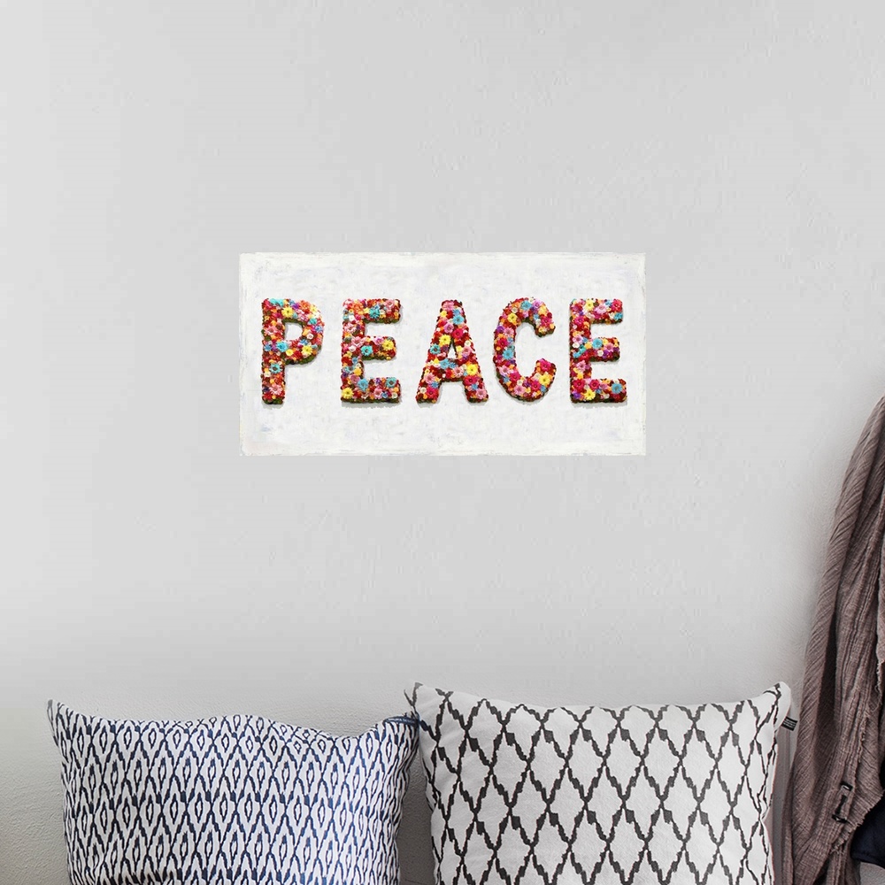 A bohemian room featuring The word peace is shaped by an assortment of colorful flowers.