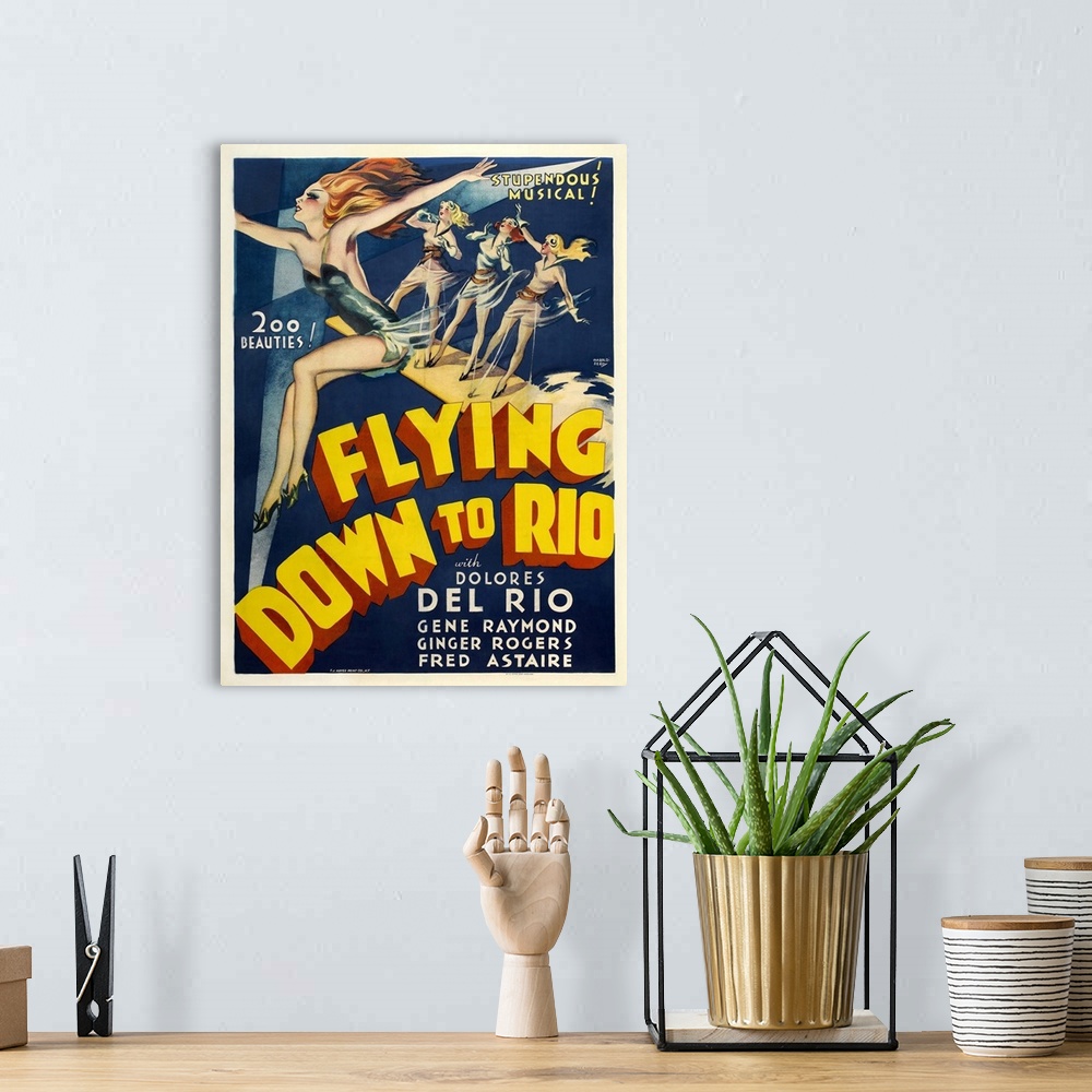 A bohemian room featuring Vintage movie poster for "Flying Down To Rio"