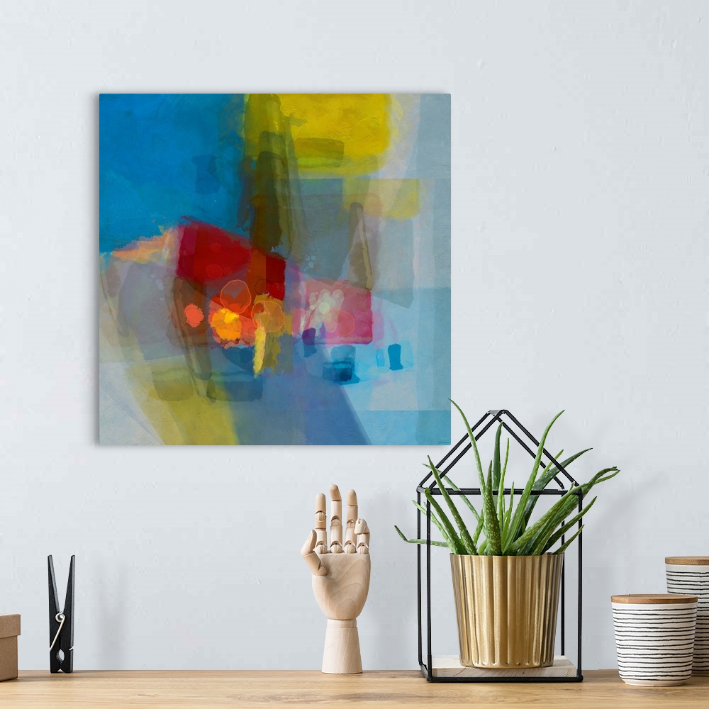 A bohemian room featuring Square abstract artwork with layered translucent hues. Square and rectangular shapes on the outsi...